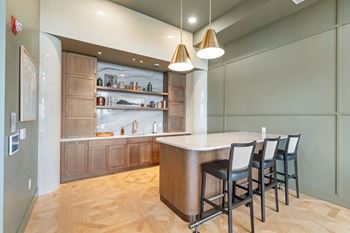 The Parlour, a reservable community amenity at Lilia Apartments in Lilydale, MN 55118